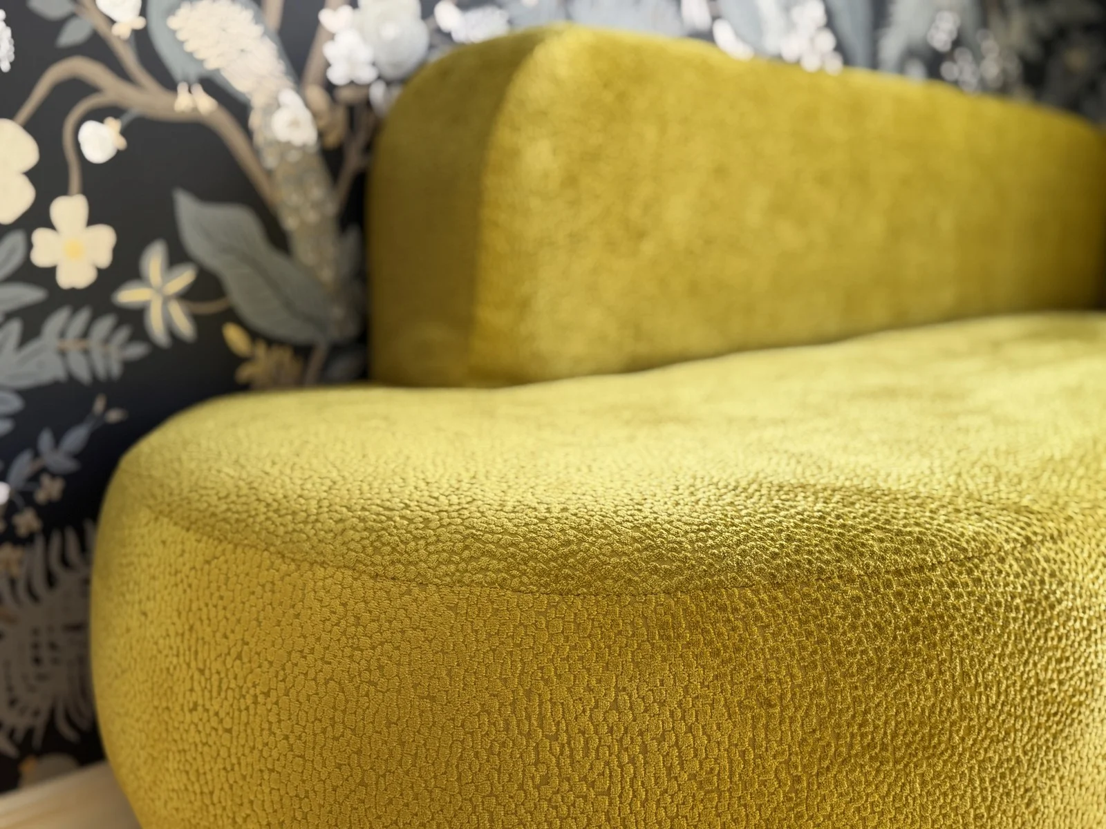 Upholstered seat, back, and rounded front corner