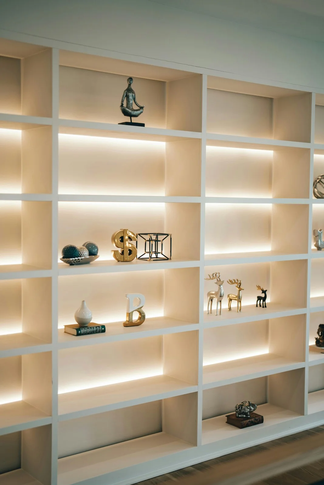 Pale open display shelving with illuminated horizontal shelves